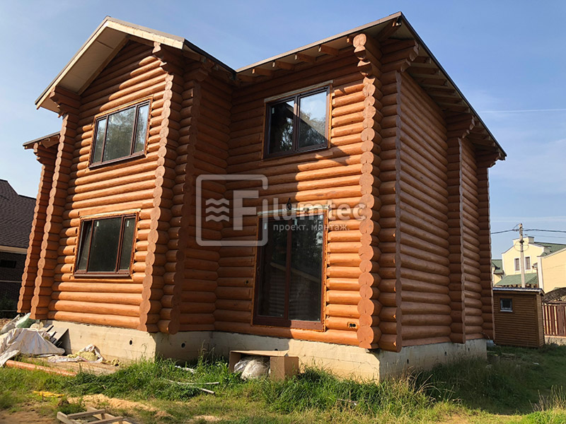 Дом из бревна площадью 215 м² и баня площадью 35 м². Фото 1